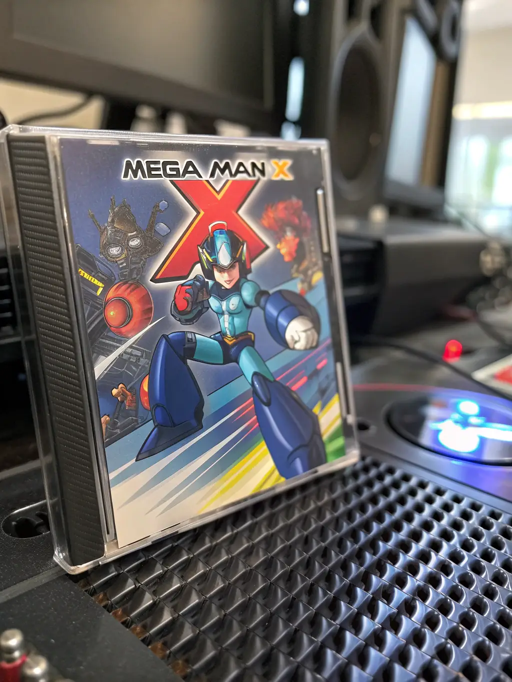 A high-quality scan of the Mega Man X soundtrack CD cover, showcasing the iconic artwork and tracklist.